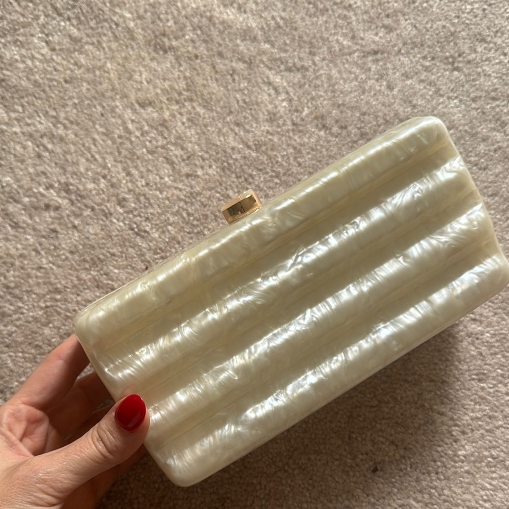 Petal & Pup Cream Clutch with Structured Design